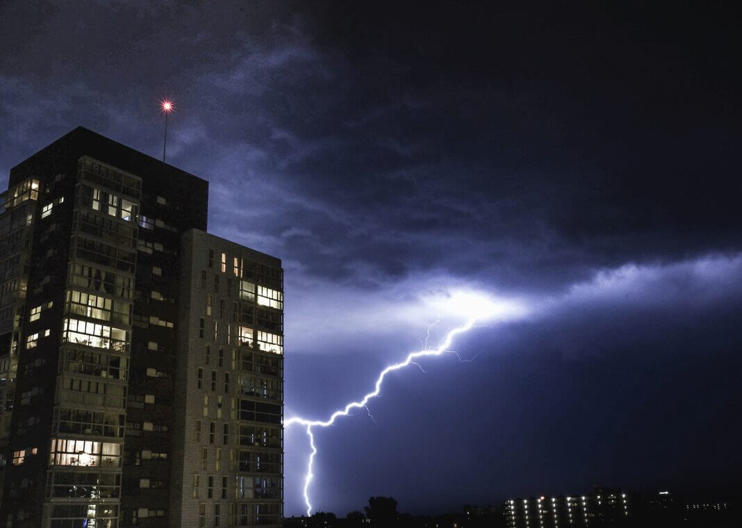 lightning bolt near office building - photo via Pixnio