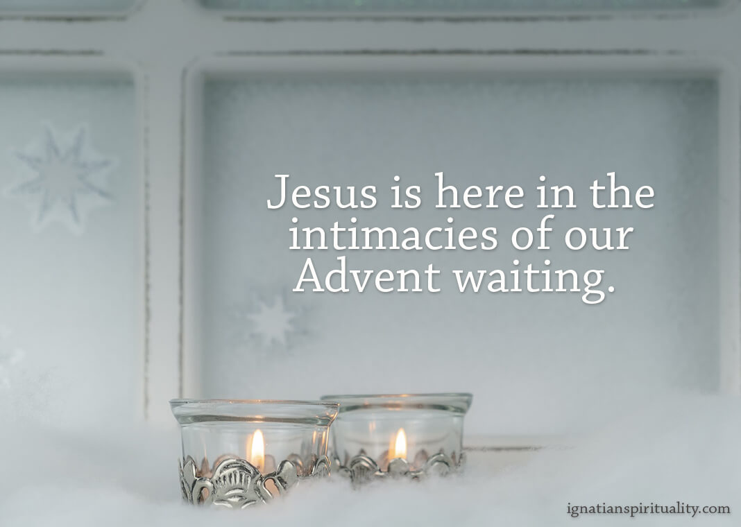 "Jesus is here in the intimacies of our Advent waiting." - Shemaiah Gonzalez quote on winter window with two lit candles - image by Couleur from Pixabay